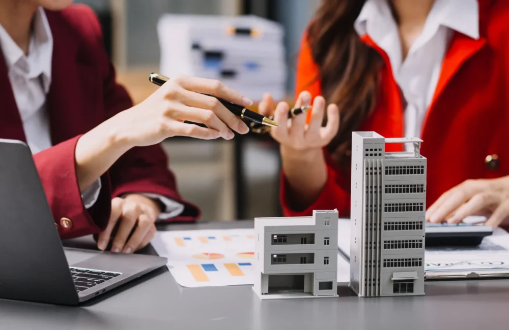 discussion-with-real-estate-agent-house-model-with-agent-customer-discussing-contract-buy-get-insurance-loan-real-estate-property
